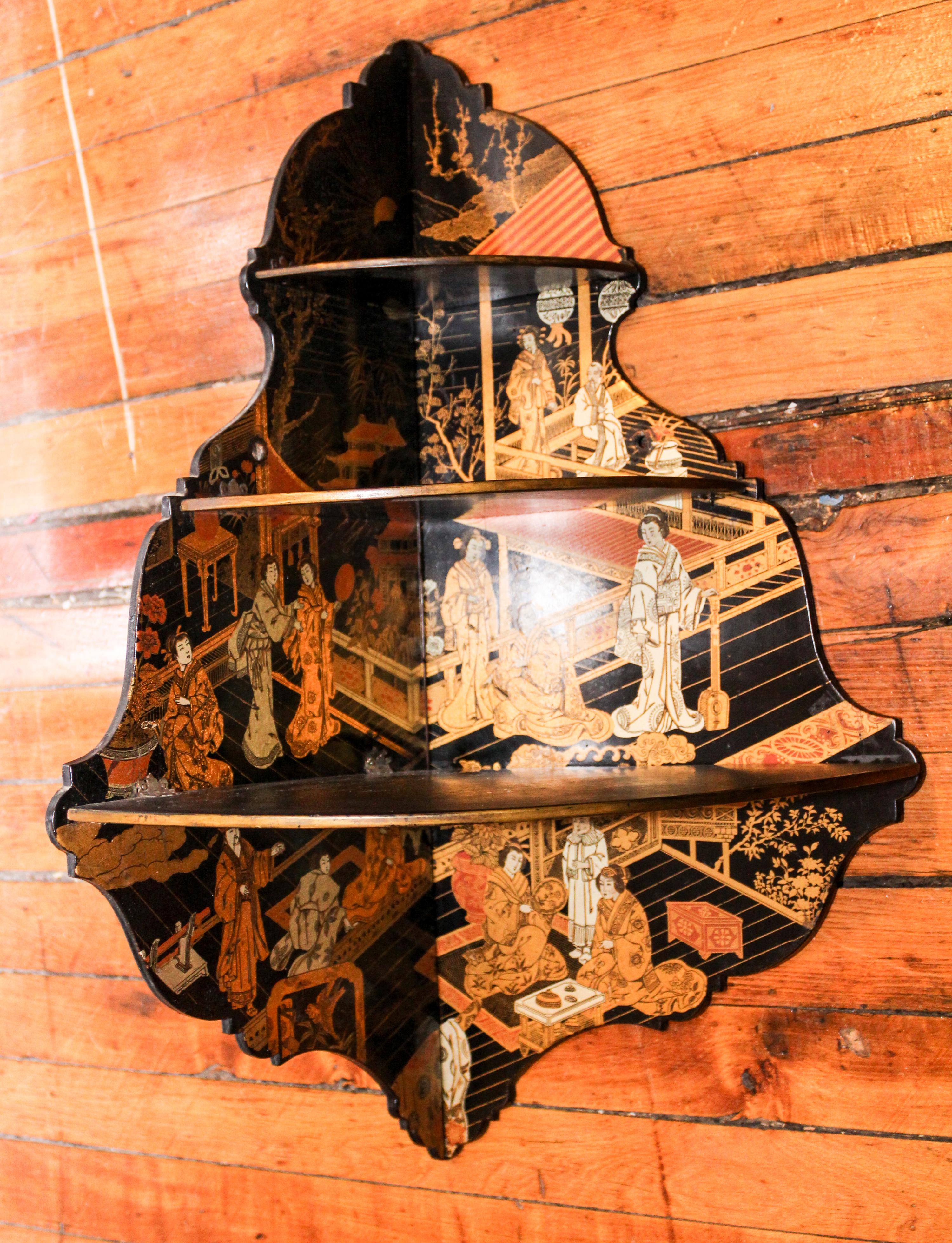 A Japanese Carved Wood Etagere. Length 23 inches.