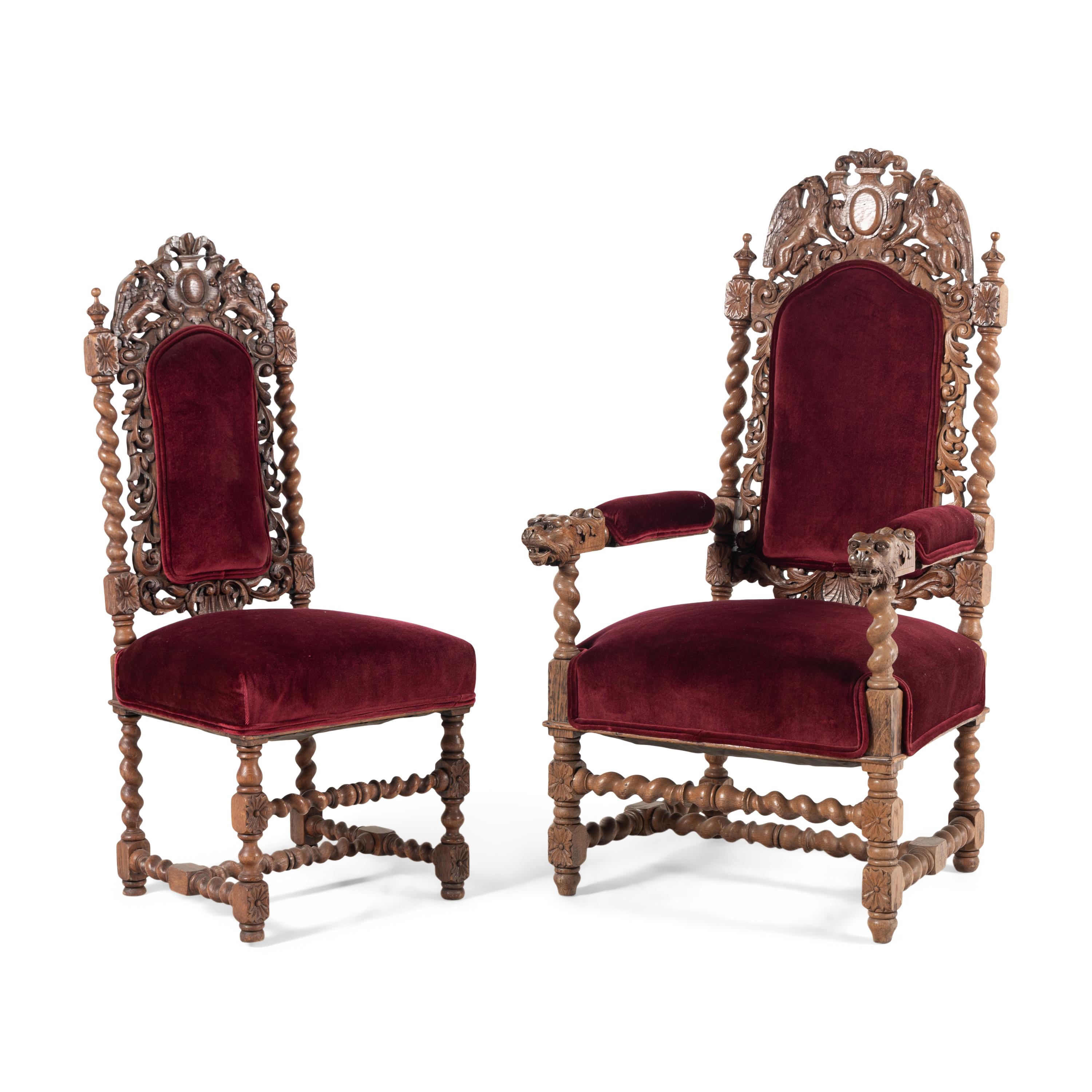 A Set of Twelve Charles II Style Carved Oak Dining Chairs