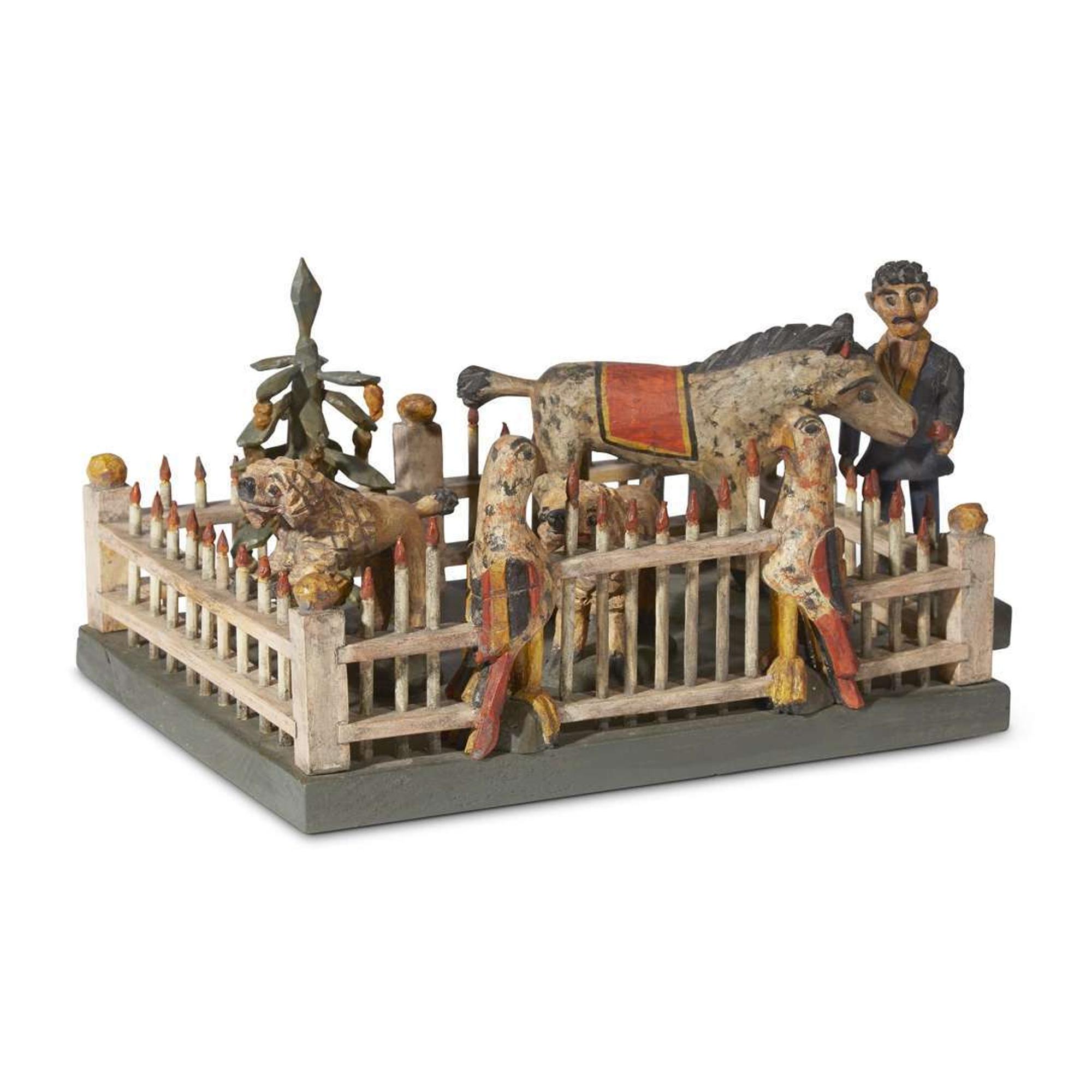 Carved and painted fenced garden with animals, tree and man in the manner of Wilhelm Schimmel (1817-1890) signed and dated "Robert Stauffer 1993"