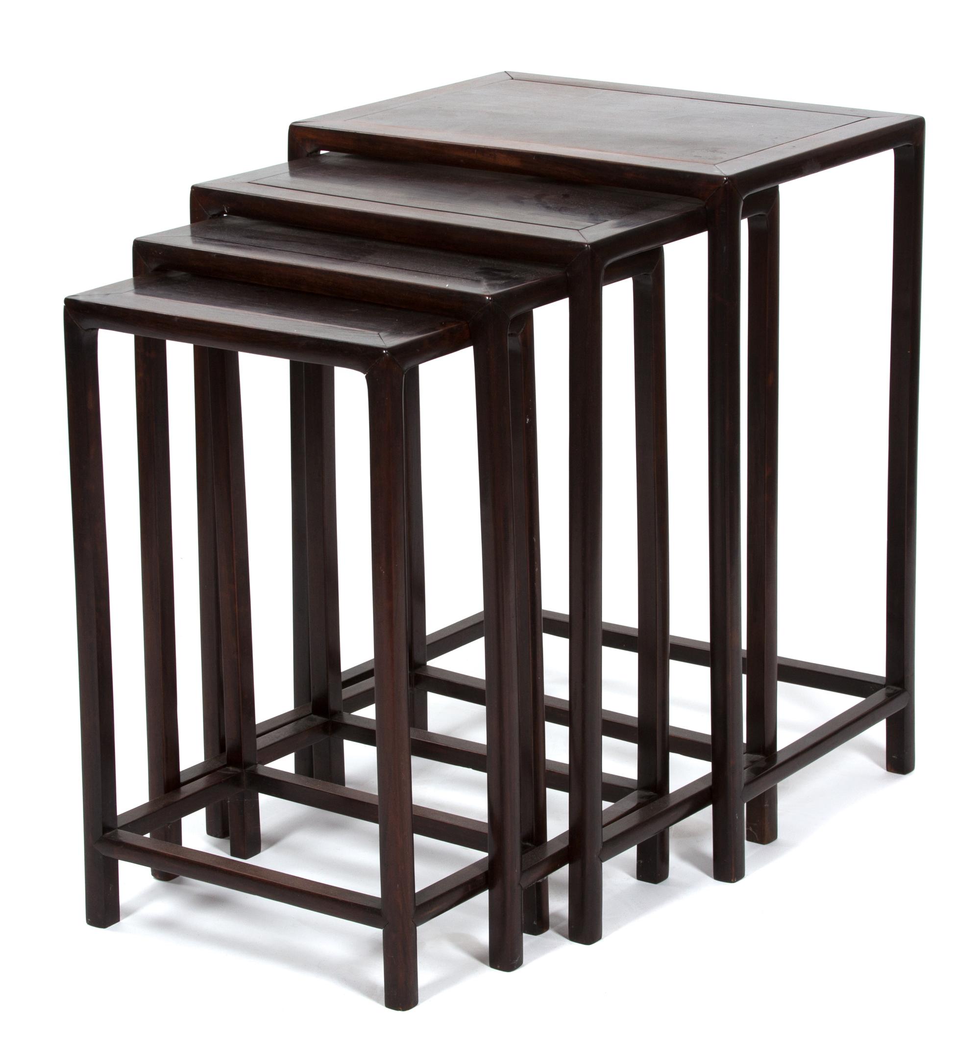 A Nest of Four Chinese Rosewood Nesting Tables Height 27 x width 20 x depth 14 3/4 inches. — 20TH CENTURY
