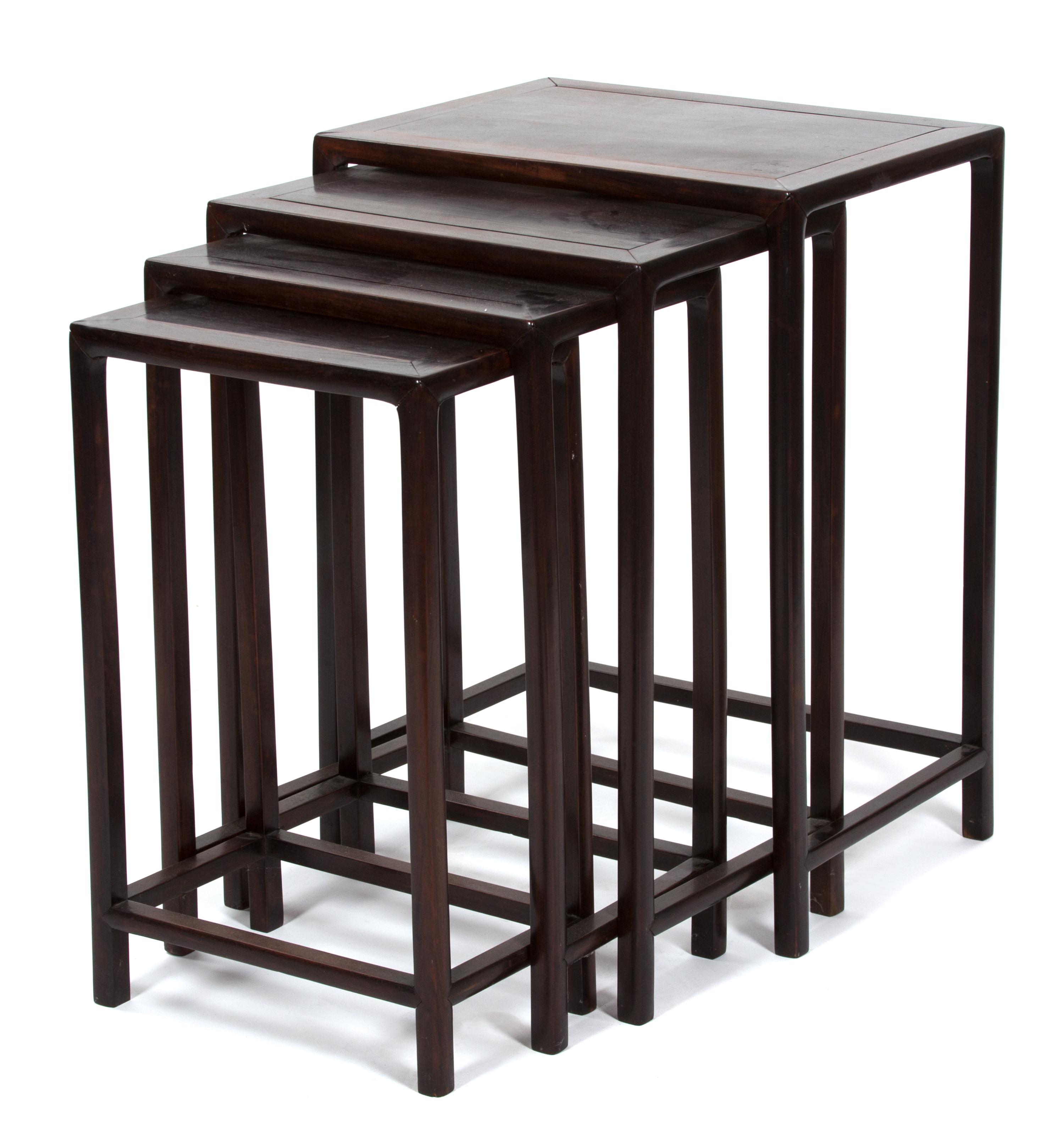 A Nest of Four Chinese Rosewood Nesting Tables Height 27 x width 20 x depth 14 3/4 inches. — 20TH CENTURY