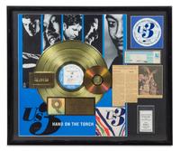 An Us 3: Hand on the Torch RIAA Certified Gold Persentation Album 22 x 26 inches.