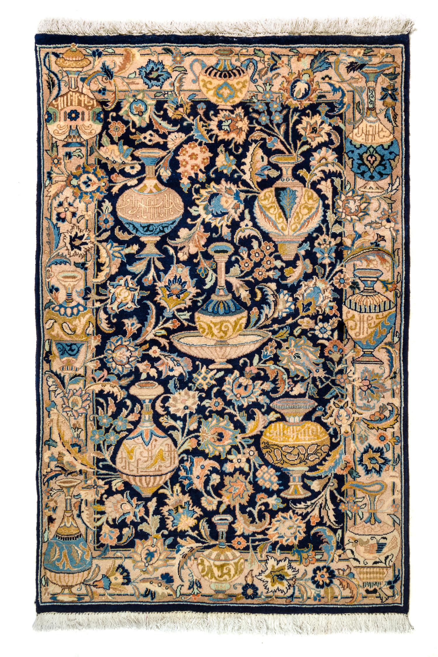 A Kashan Wool Rug 4 feet 11 inches x 3 feet 2 inches.