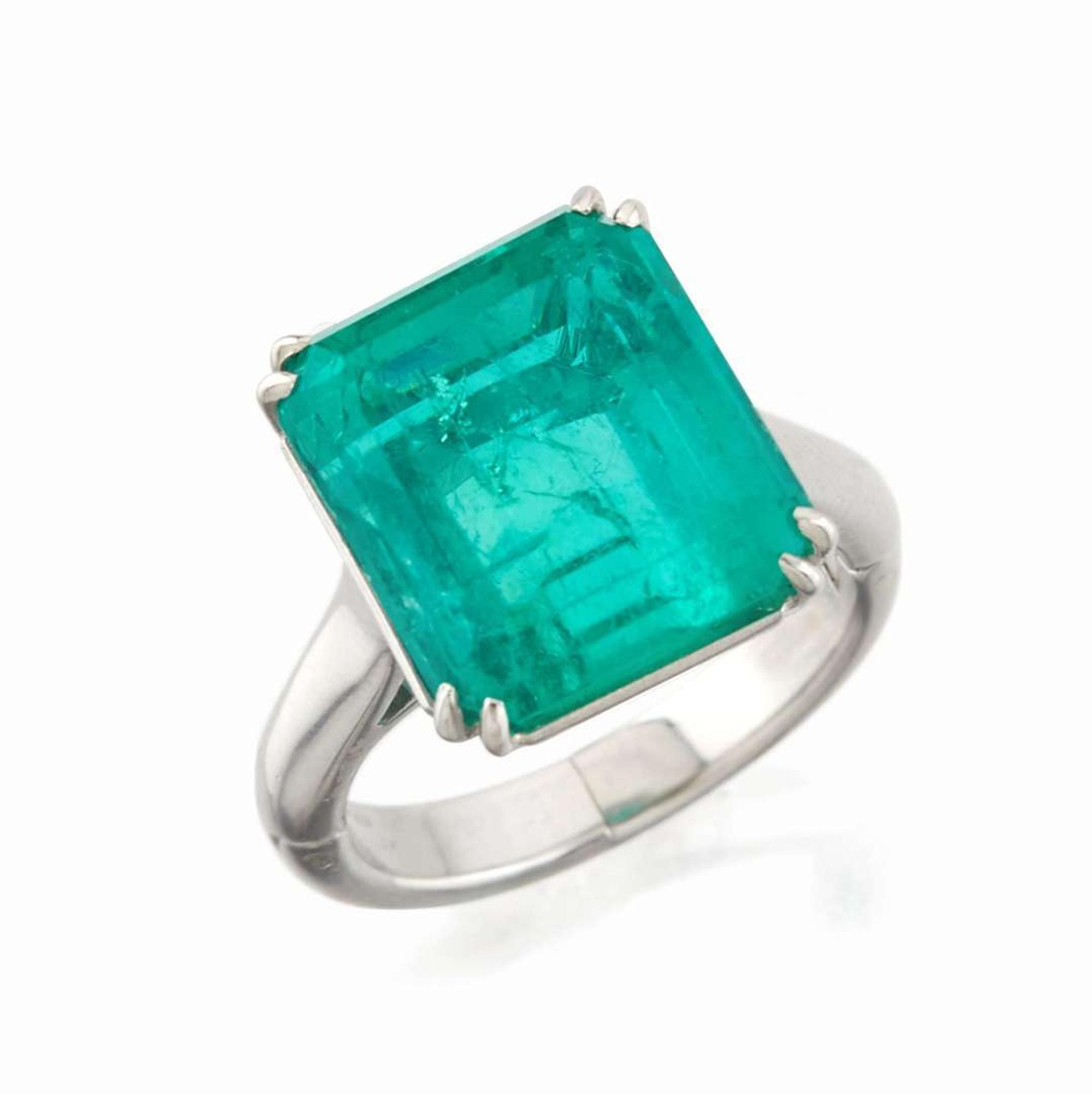 An emerald and platinum ring, Cartier