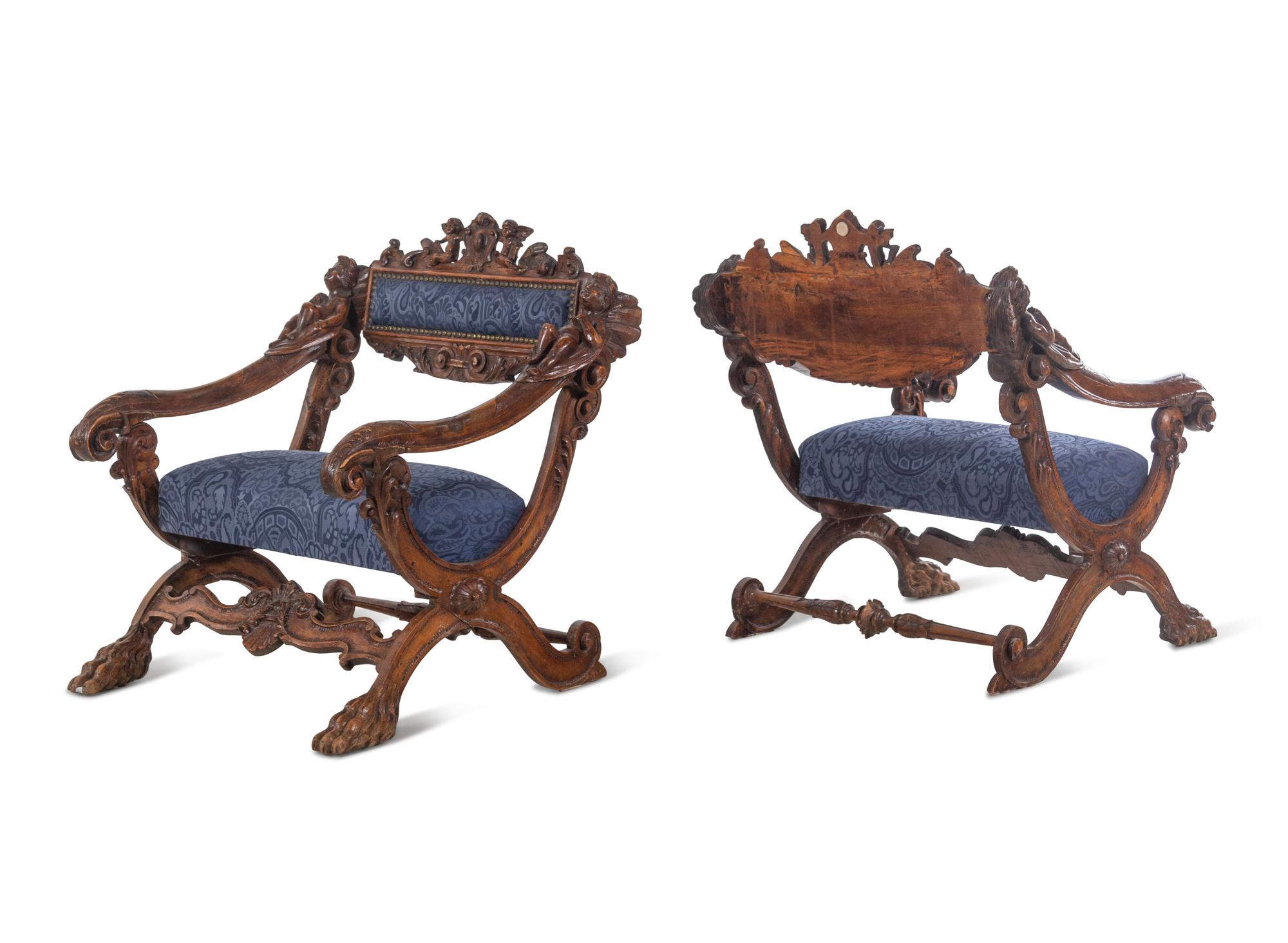 A Pair of Italian Renaissance Style Carved Walnut Armchairs