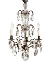 A Louis XV Style Gilt Metal and Crystal Four-Light Chandelier — EARLY 20TH CENTURY