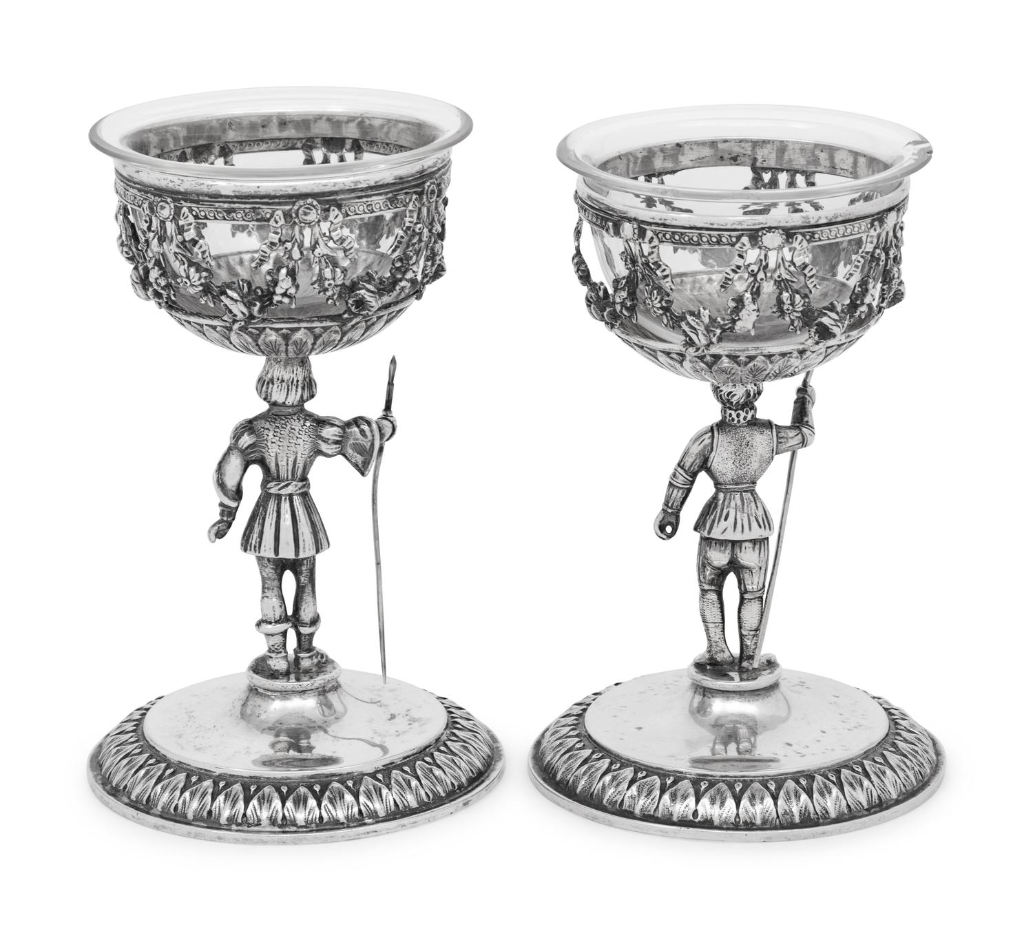 A Pair of German Silver Figural Goblets with Glass Liners