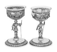 A Pair of German Silver Figural Goblets with Glass Liners