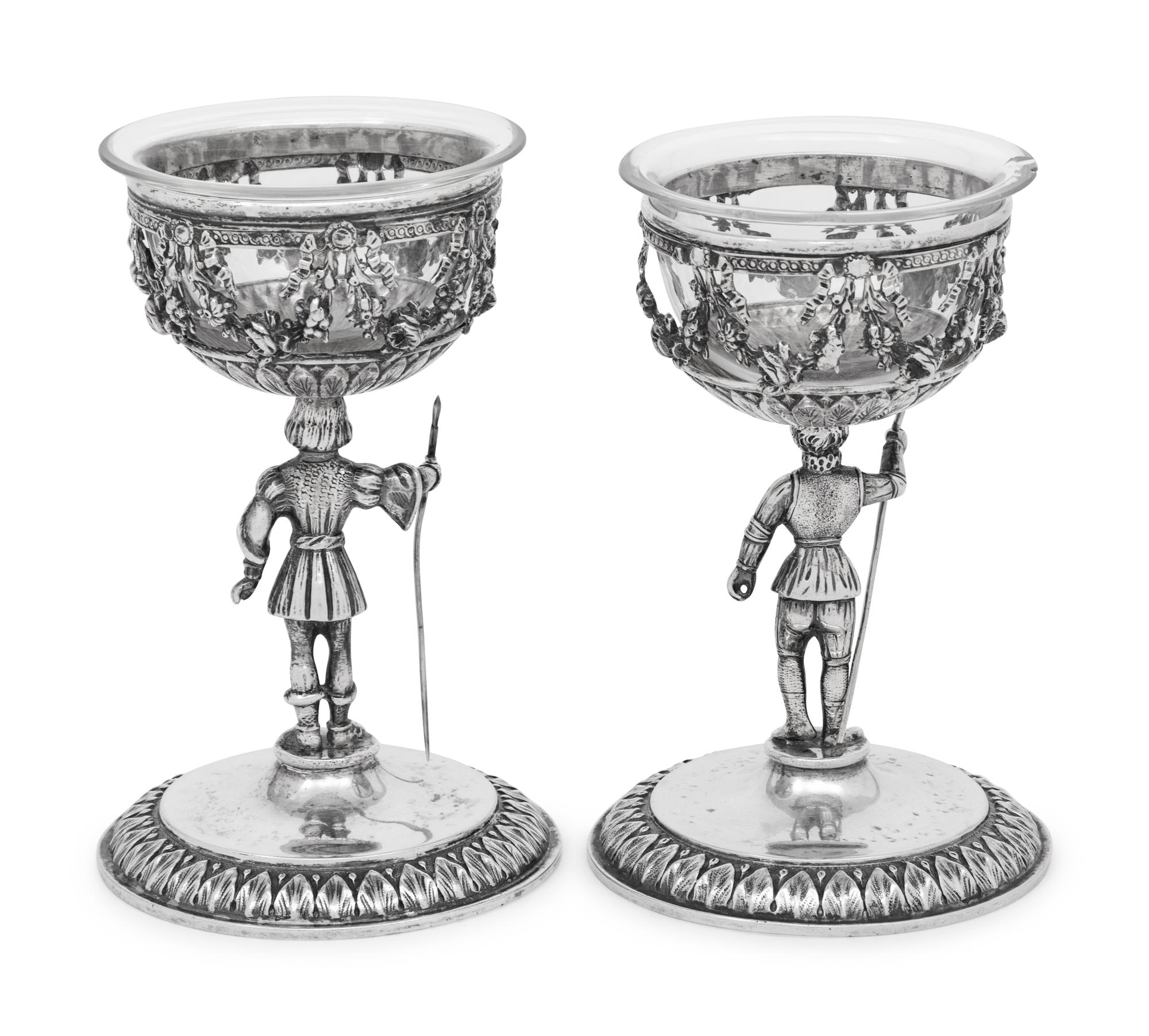 A Pair of German Silver Figural Goblets with Glass Liners