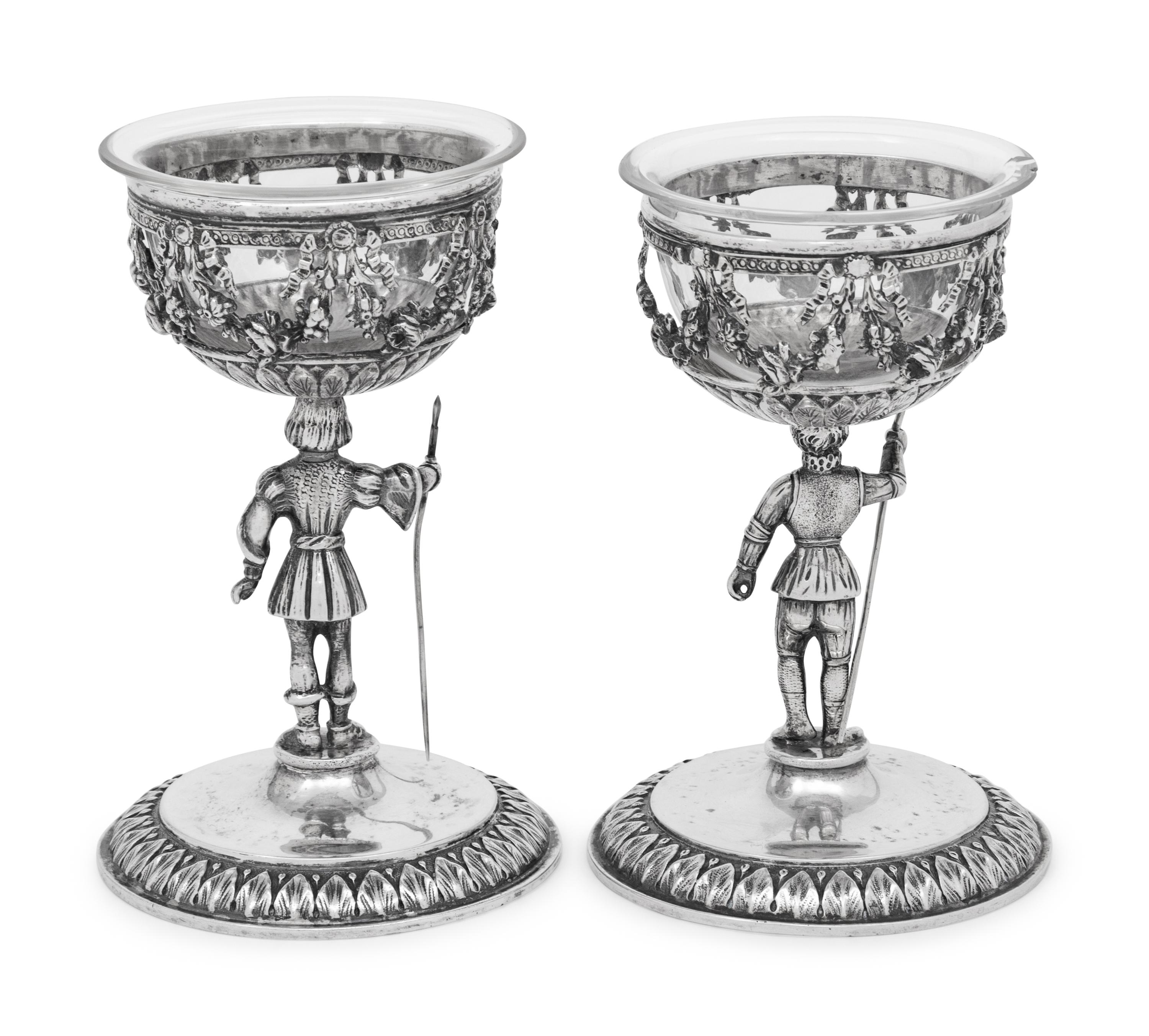 A Pair of German Silver Figural Goblets with Glass Liners