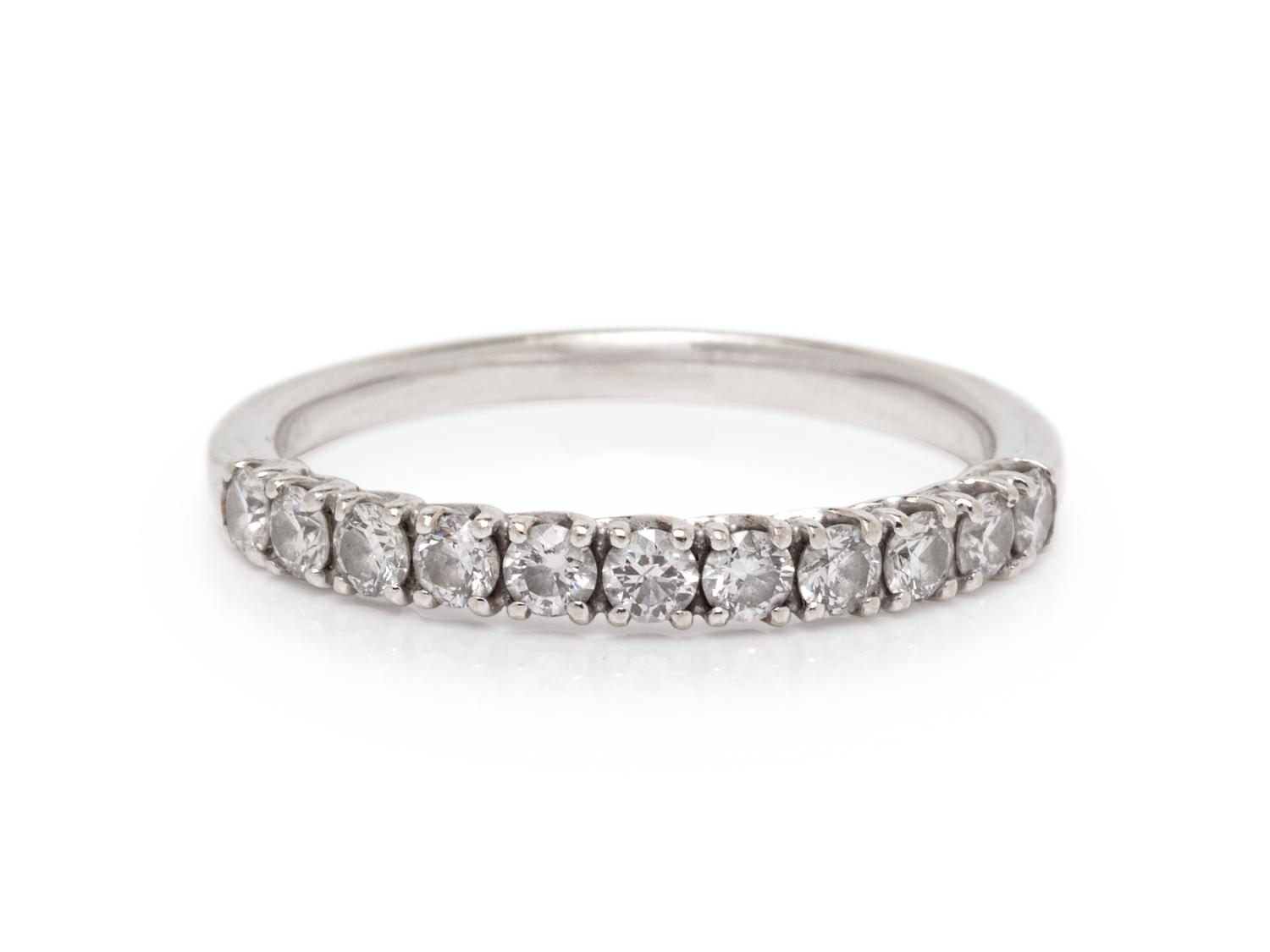 A 14 Karat White Gold and Diamond Ring,