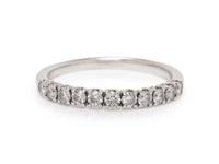 A 14 Karat White Gold and Diamond Ring,