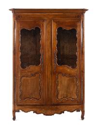 A French Provincial Walnut Armoire