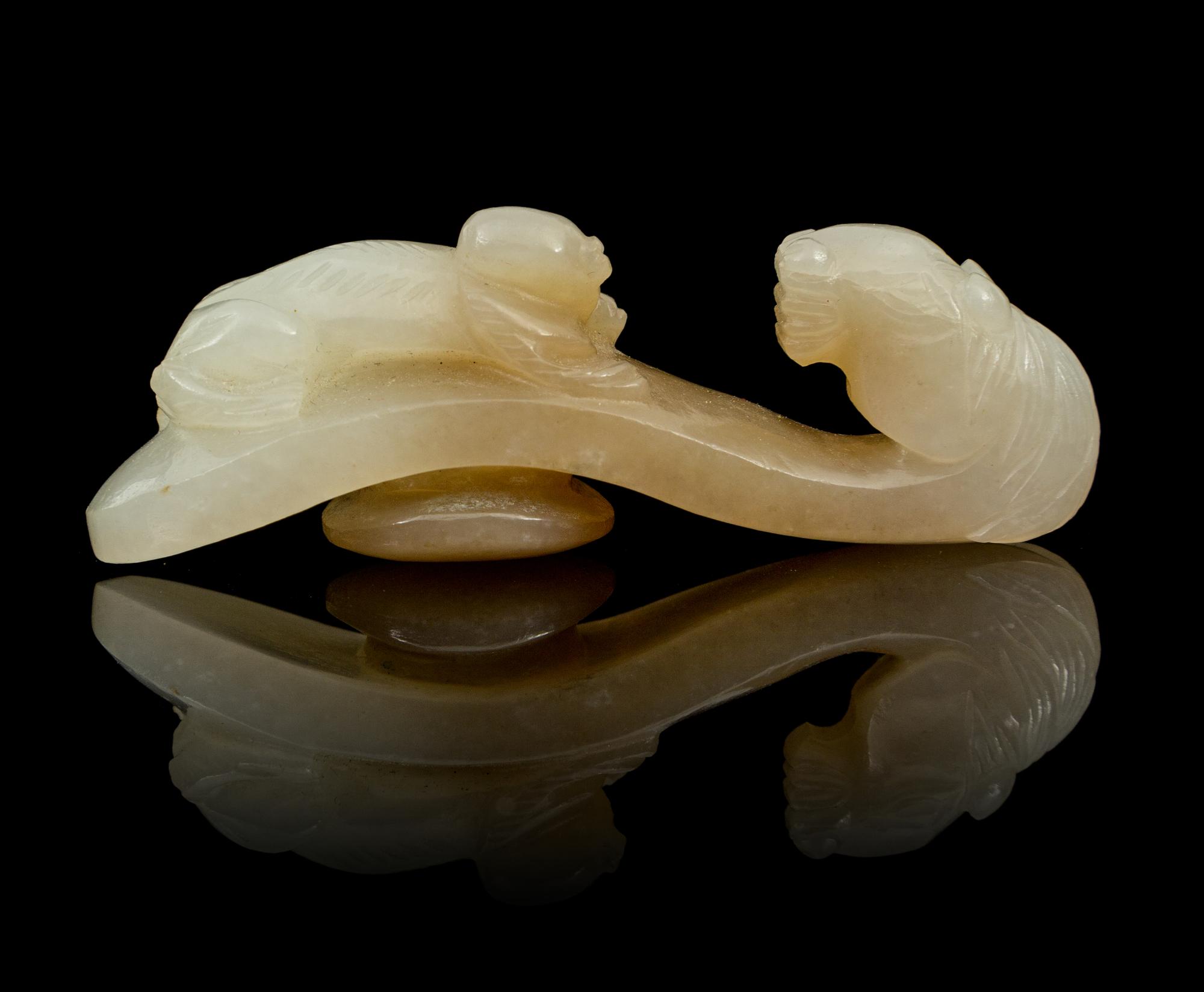 A Carved Jade Belt Hook Length 2 3/4 inches.