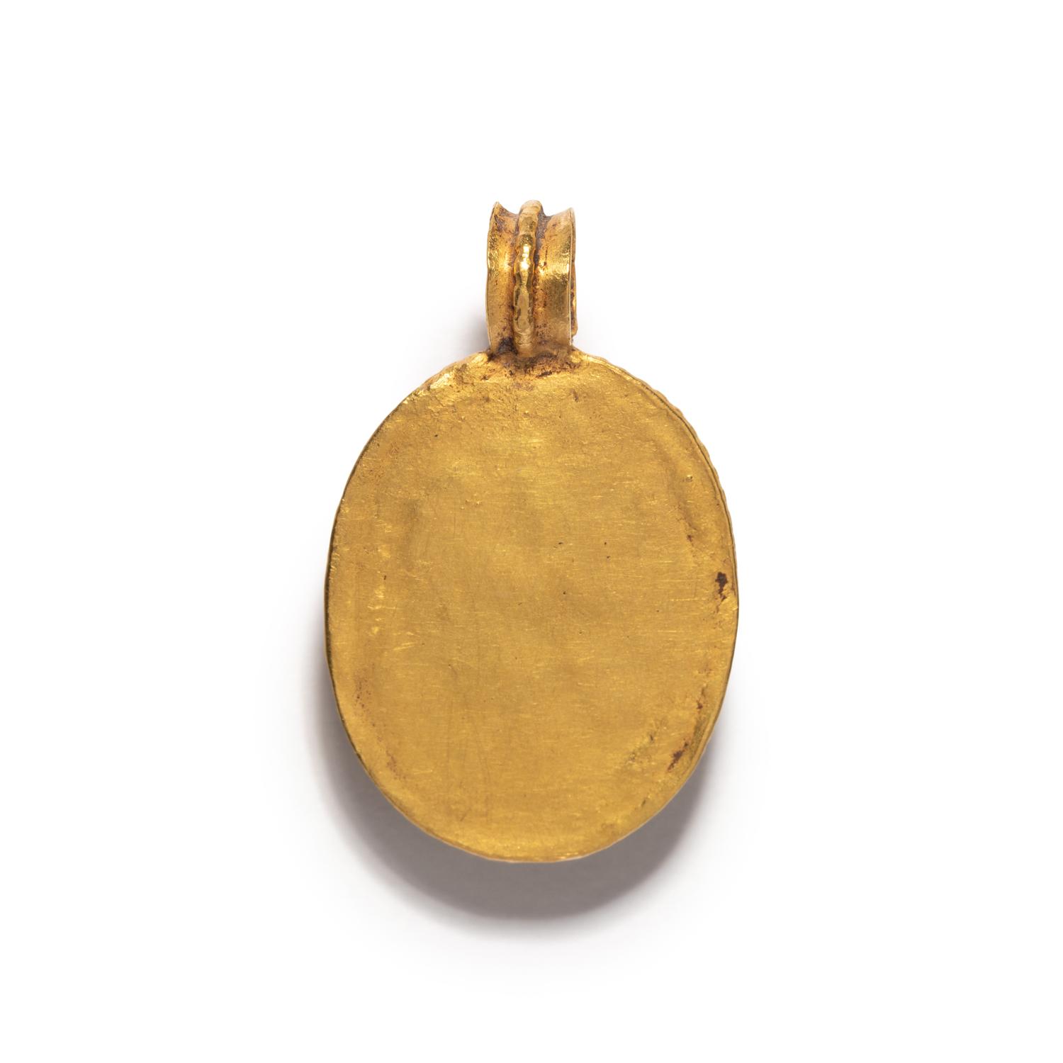 A Roman Gold and Carnelian Cabochon Pendant