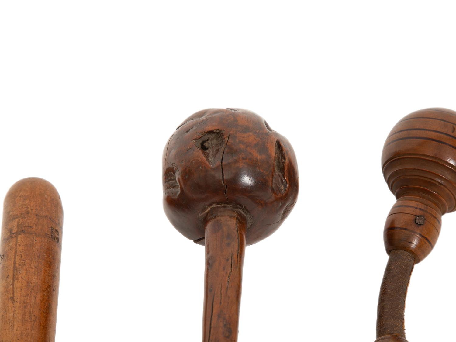 Three Carved Wood Clubs