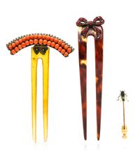 A Collection of Antique Hair Combs and Enameled Fly Stick Pin,