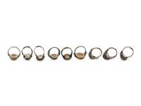 Nine Chinese Carnelian Agate Inset Metal Rings