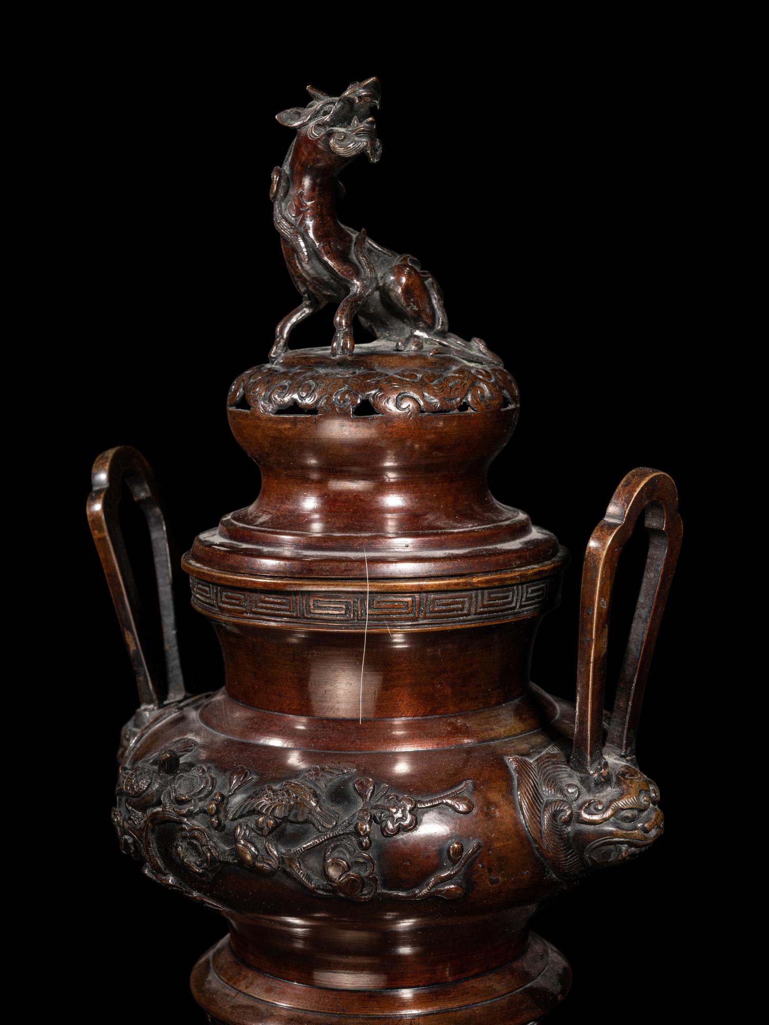 Two Japanese Pagoda-Form Bronze Lanterns and A Bronze Incense Burner