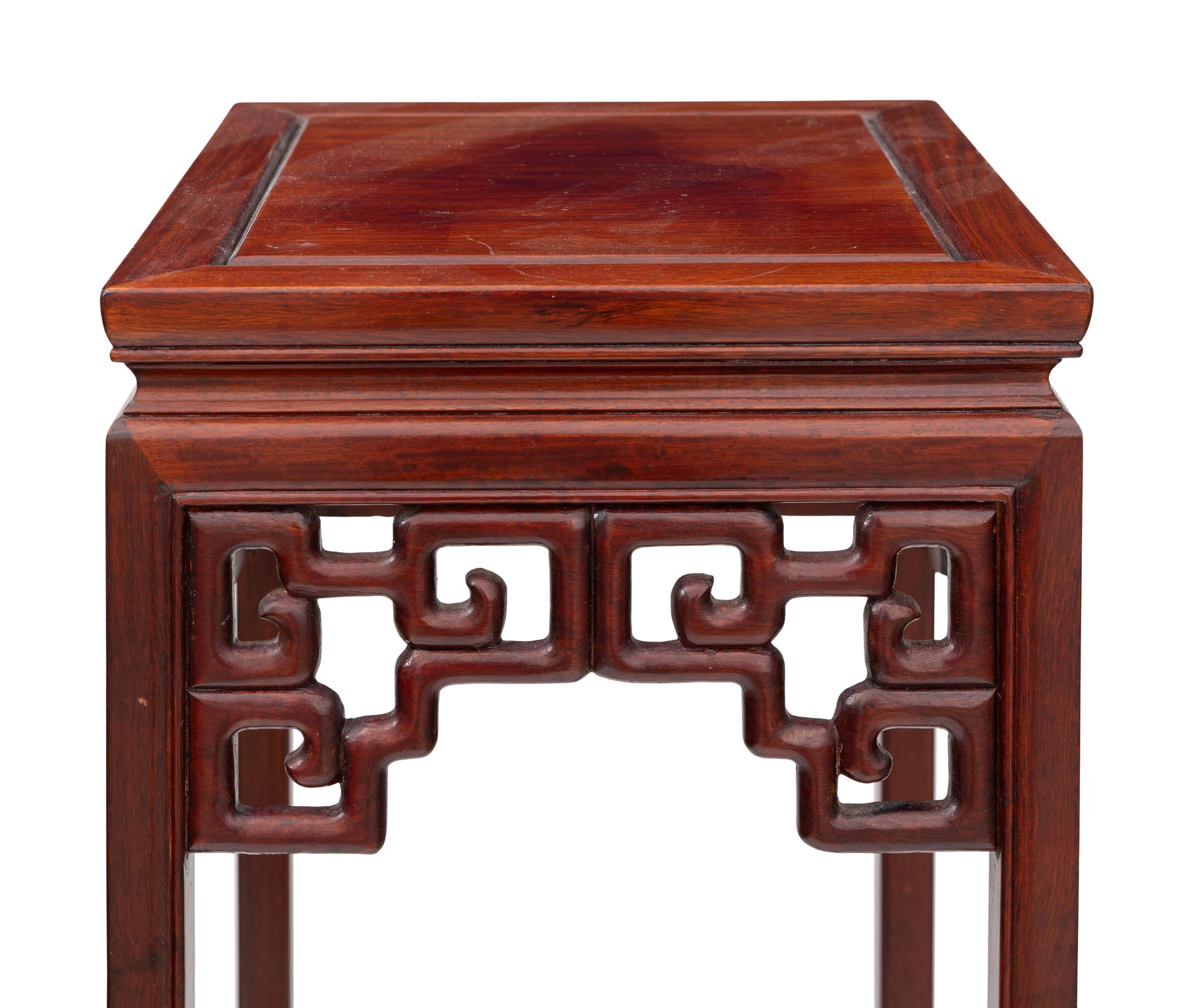 A Pair of Chinese Hardwood Pedestals