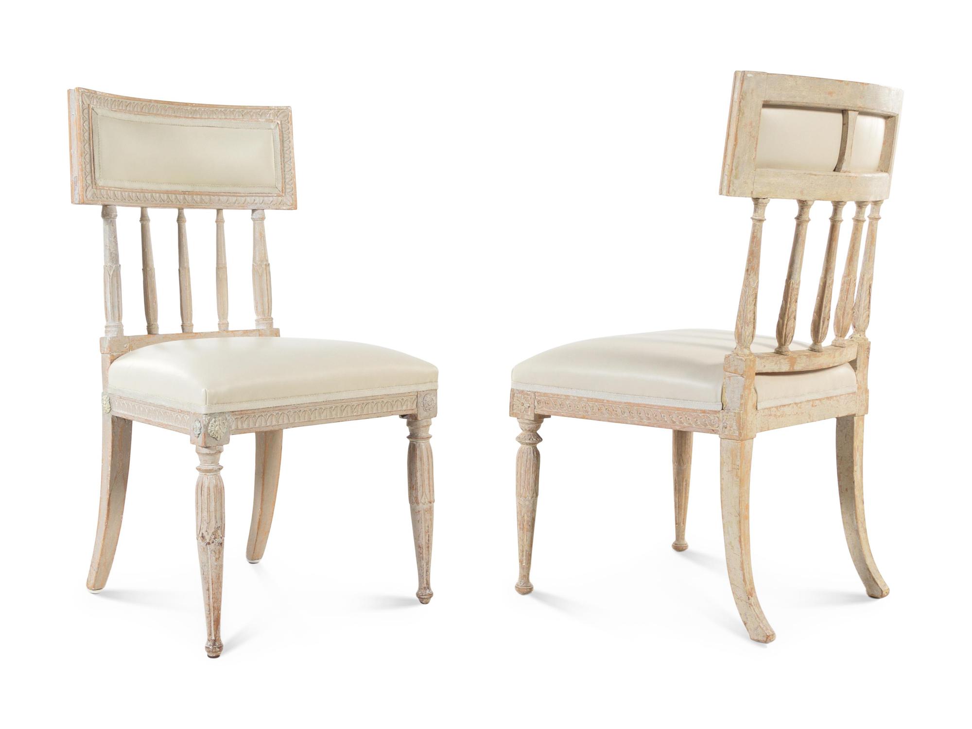 A Set of Eight Gustavian White-Painted Dining Chairs