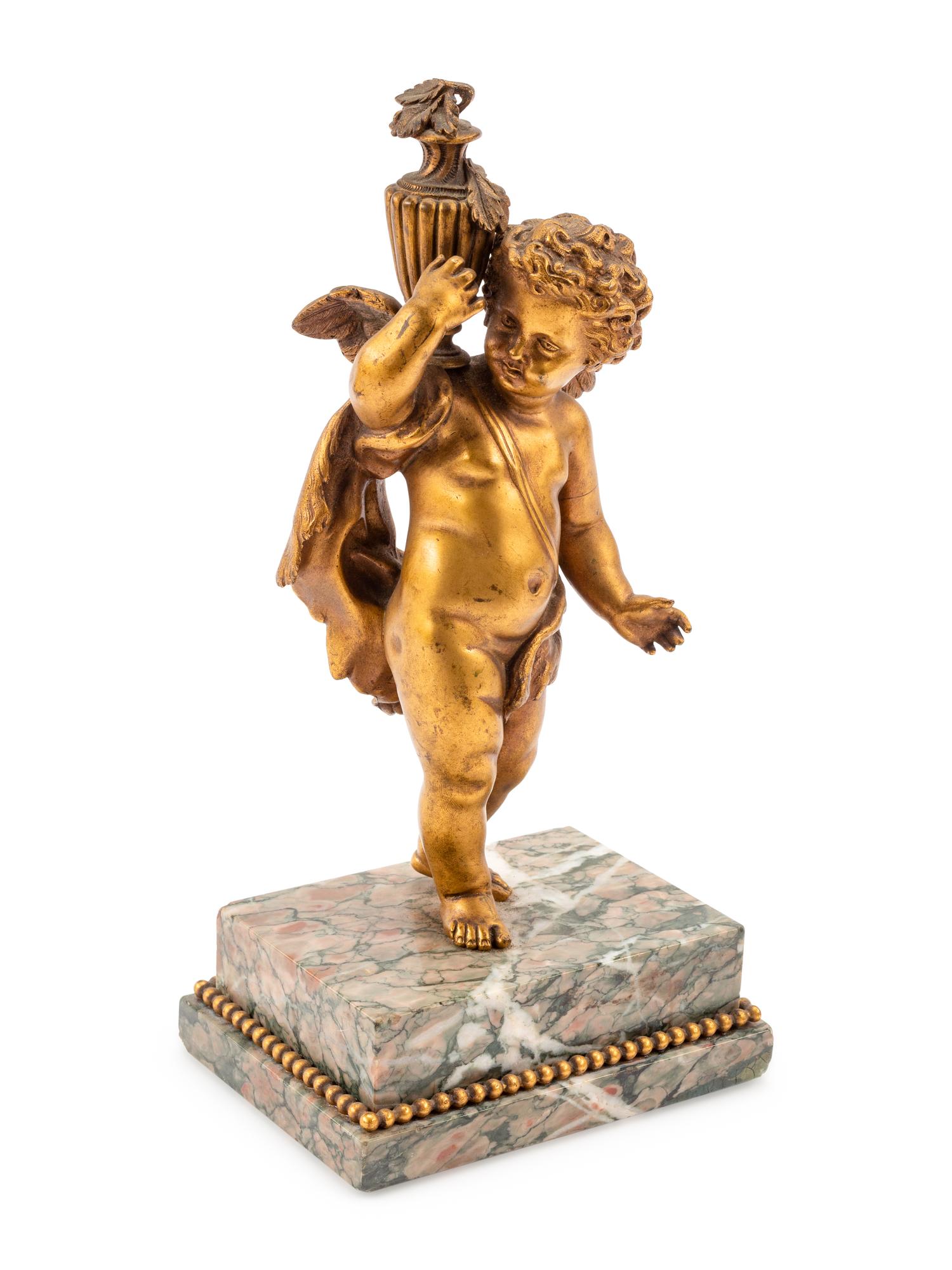 A French Gilt Bronze Figure of a Cherub on a Marble Base