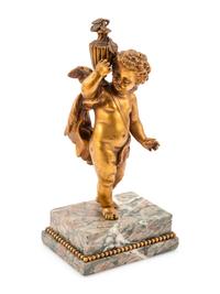 A French Gilt Bronze Figure of a Cherub on a Marble Base