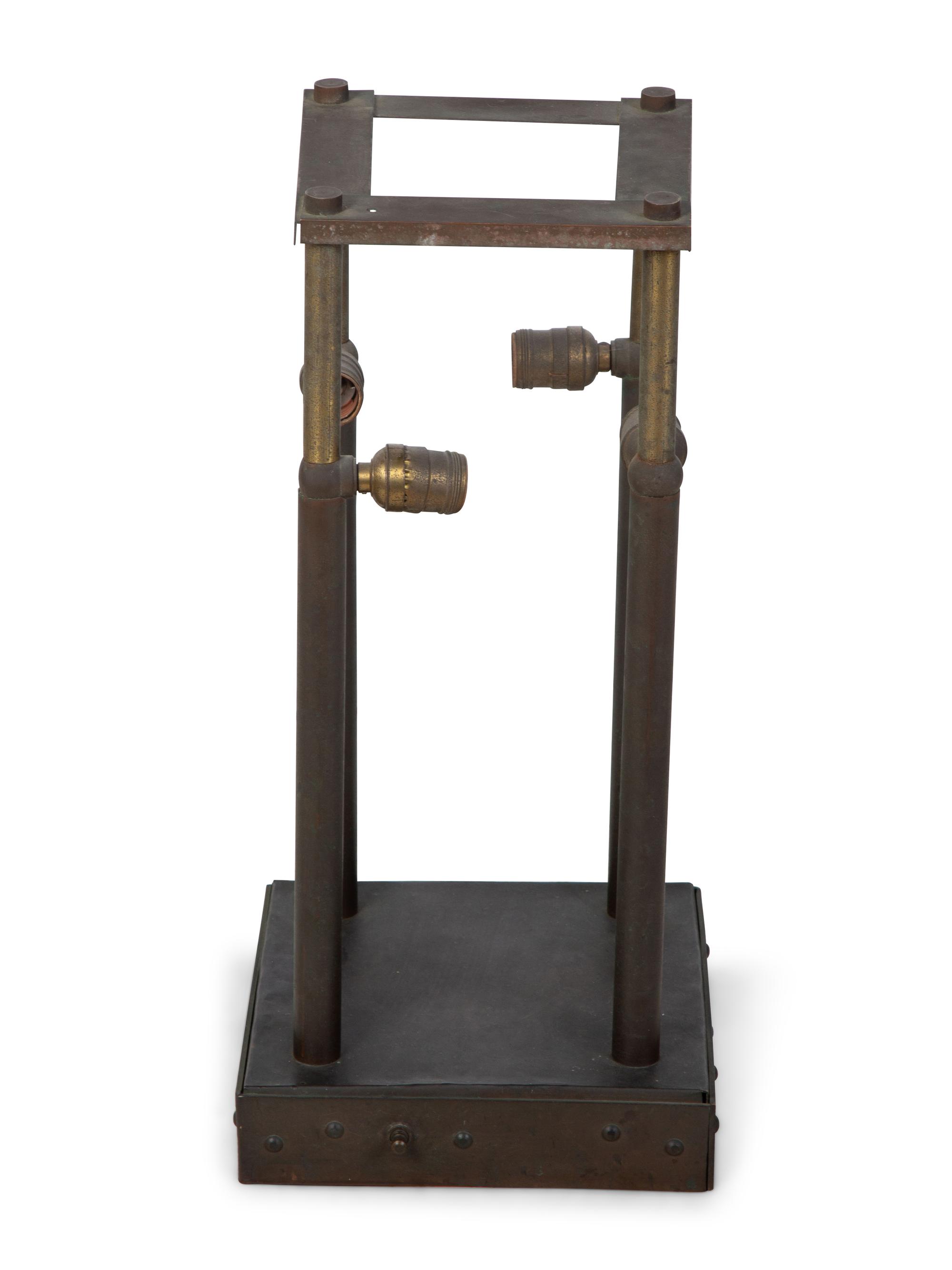 An Arts & Crafts Style Bronze Table Lamp — 20TH CENTURY