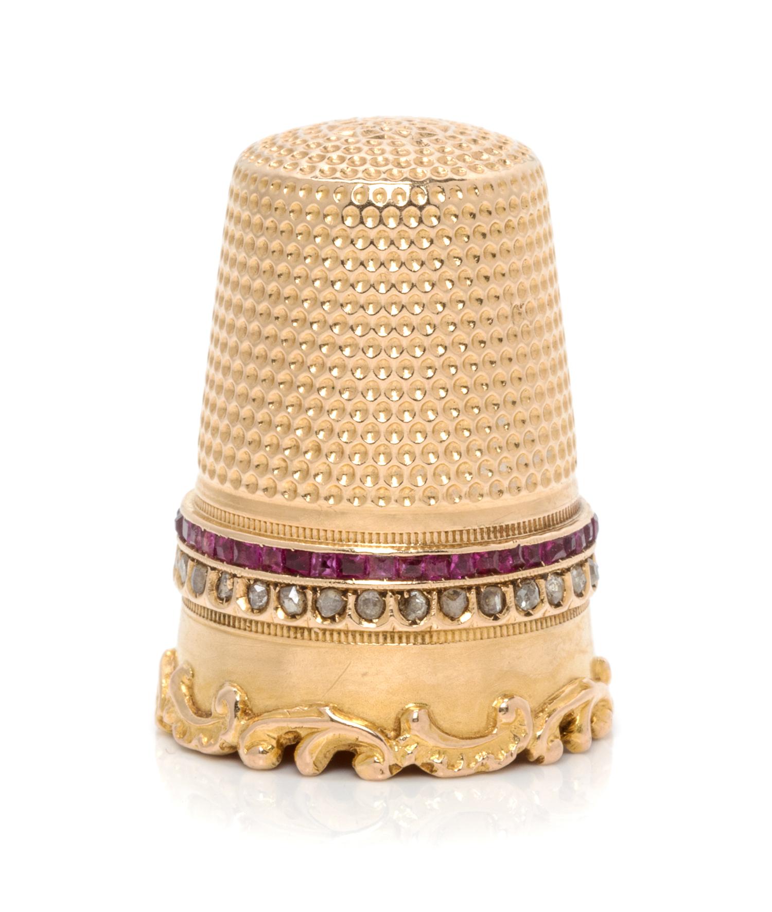 A Continental 18-Karat Yellow Gold and Gem Thimble, , the knurled top and body above a double band inset with rubies and diamonds, the