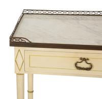A Regency Style Painted Side Table with Brass Three-Quarter Gallery Top