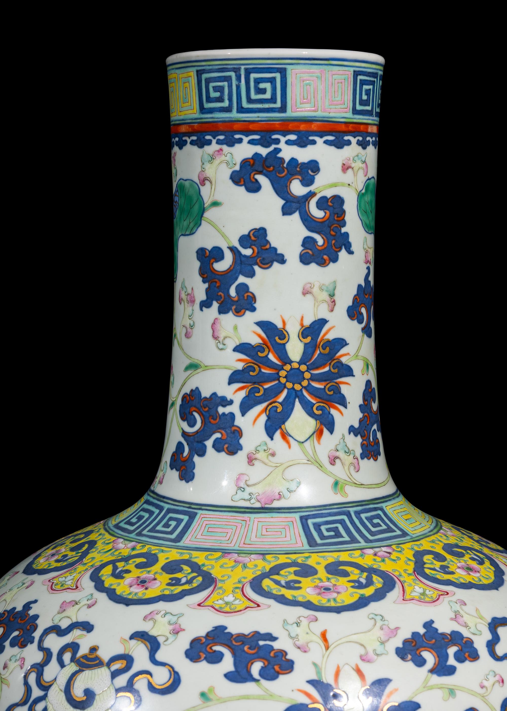A Pair of Large Chinese Famille Rose Porcelain 'Bajixiang' Vases, Tianqiuping , Late 19th-Early 20th Century 清晚期 粉彩八吉祥大天球瓶一對