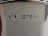 An English Silver Six-Piece Coffee & Tea Service