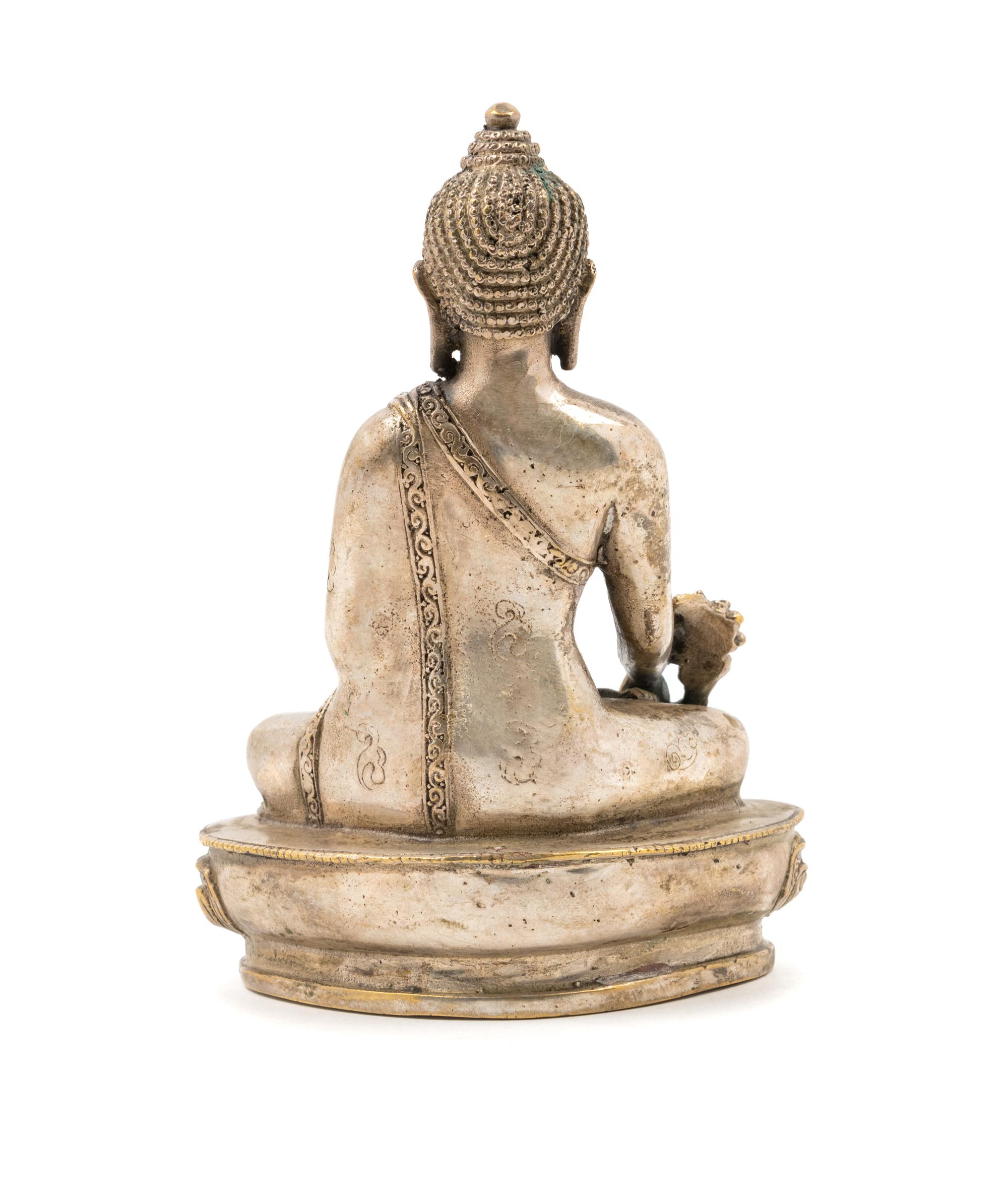 A Sino-Tibetan Bronze Figure of Seated Buddha