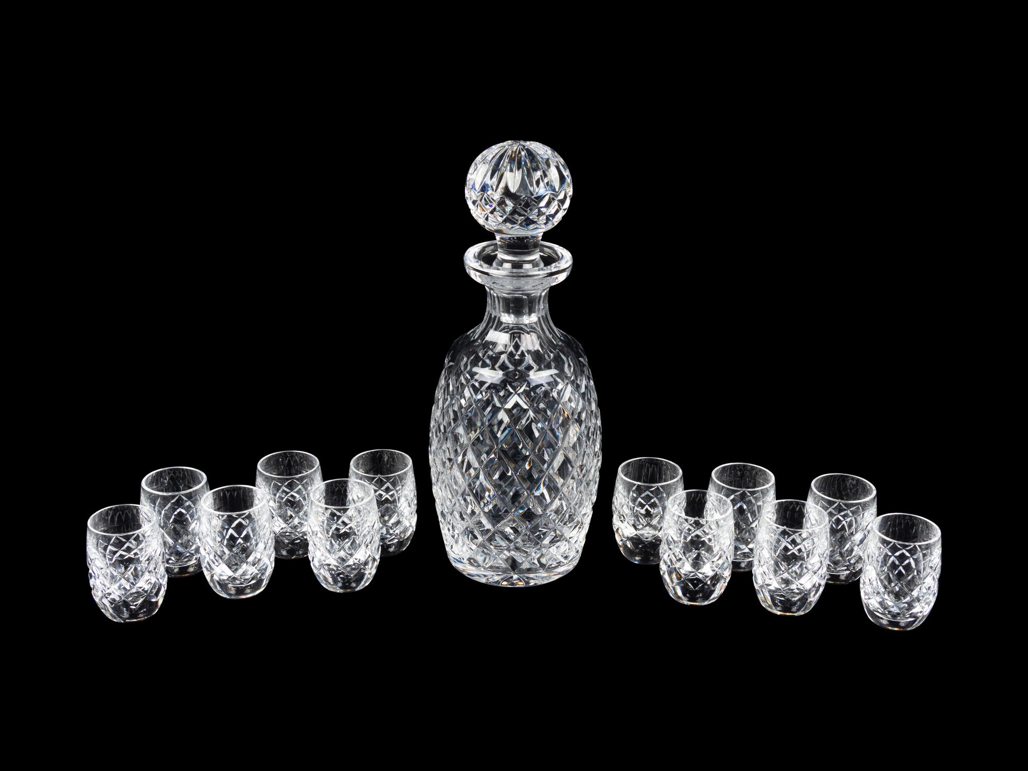 A Waterford Cut Glass Decanter and Twelve Cordials