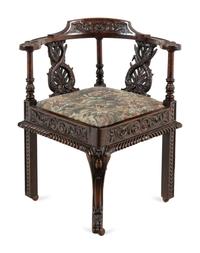 A Renaissance Revival Carved Oak Corner Chair