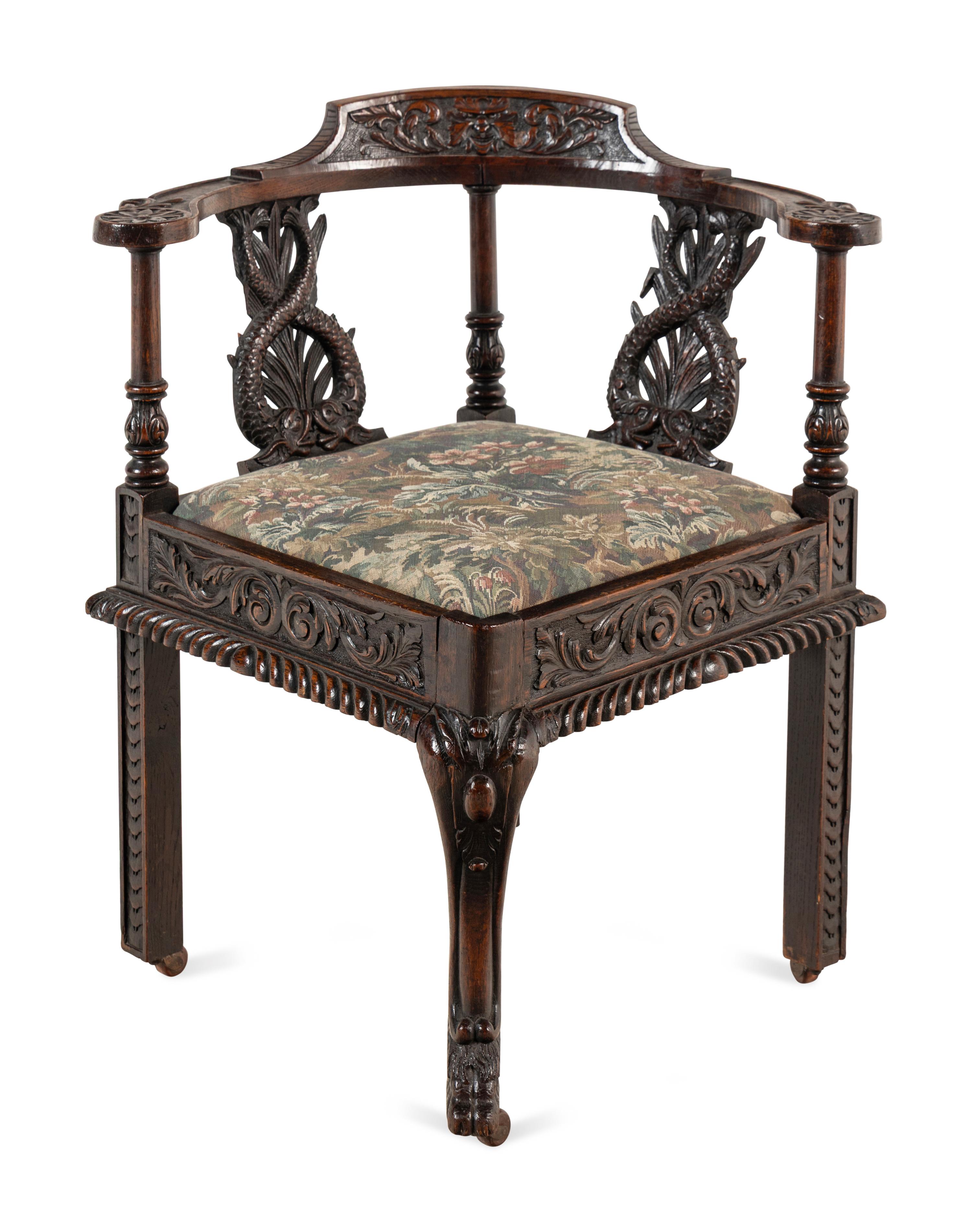 A Renaissance Revival Carved Oak Corner Chair