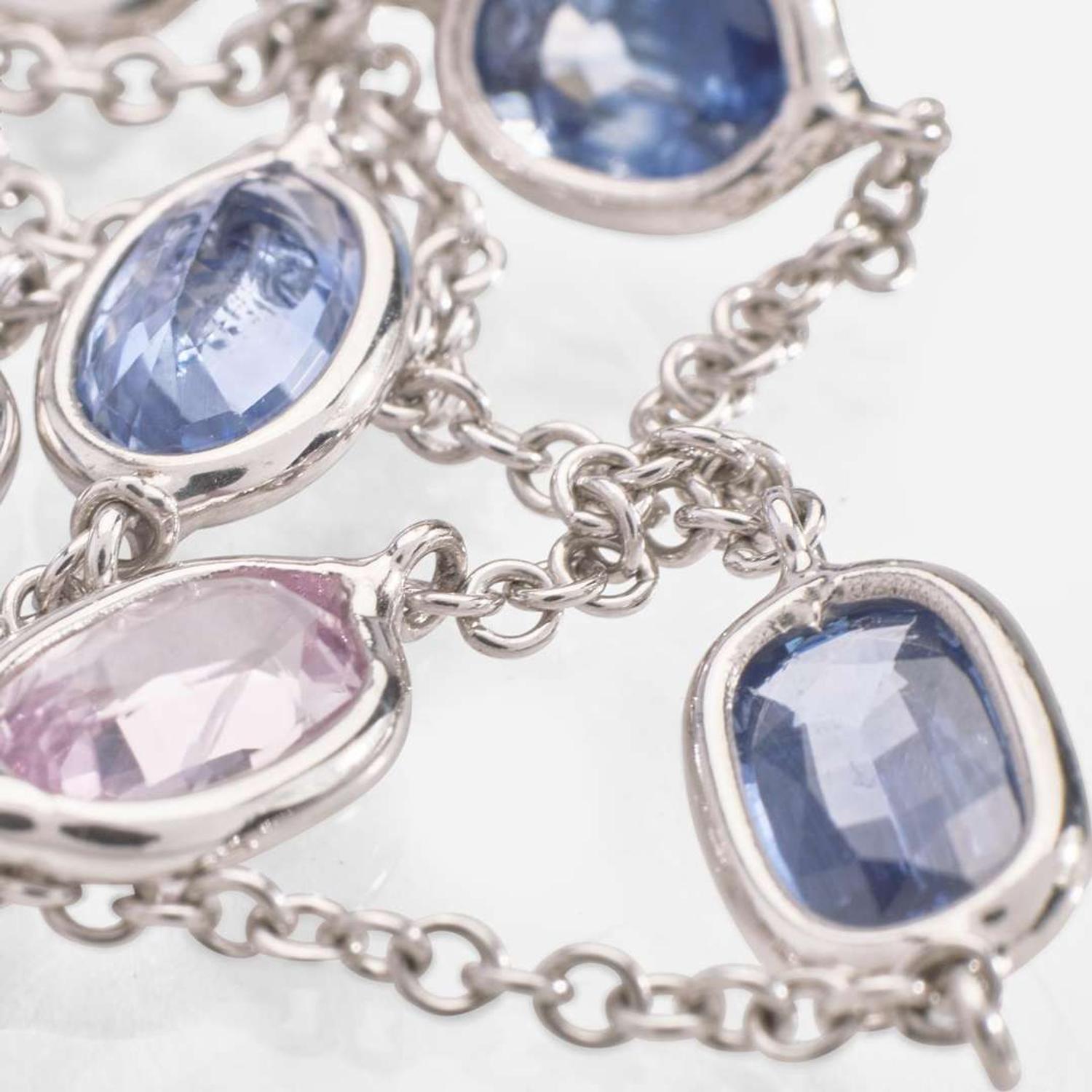 An 18 Karat White Gold Sapphire Station Necklace