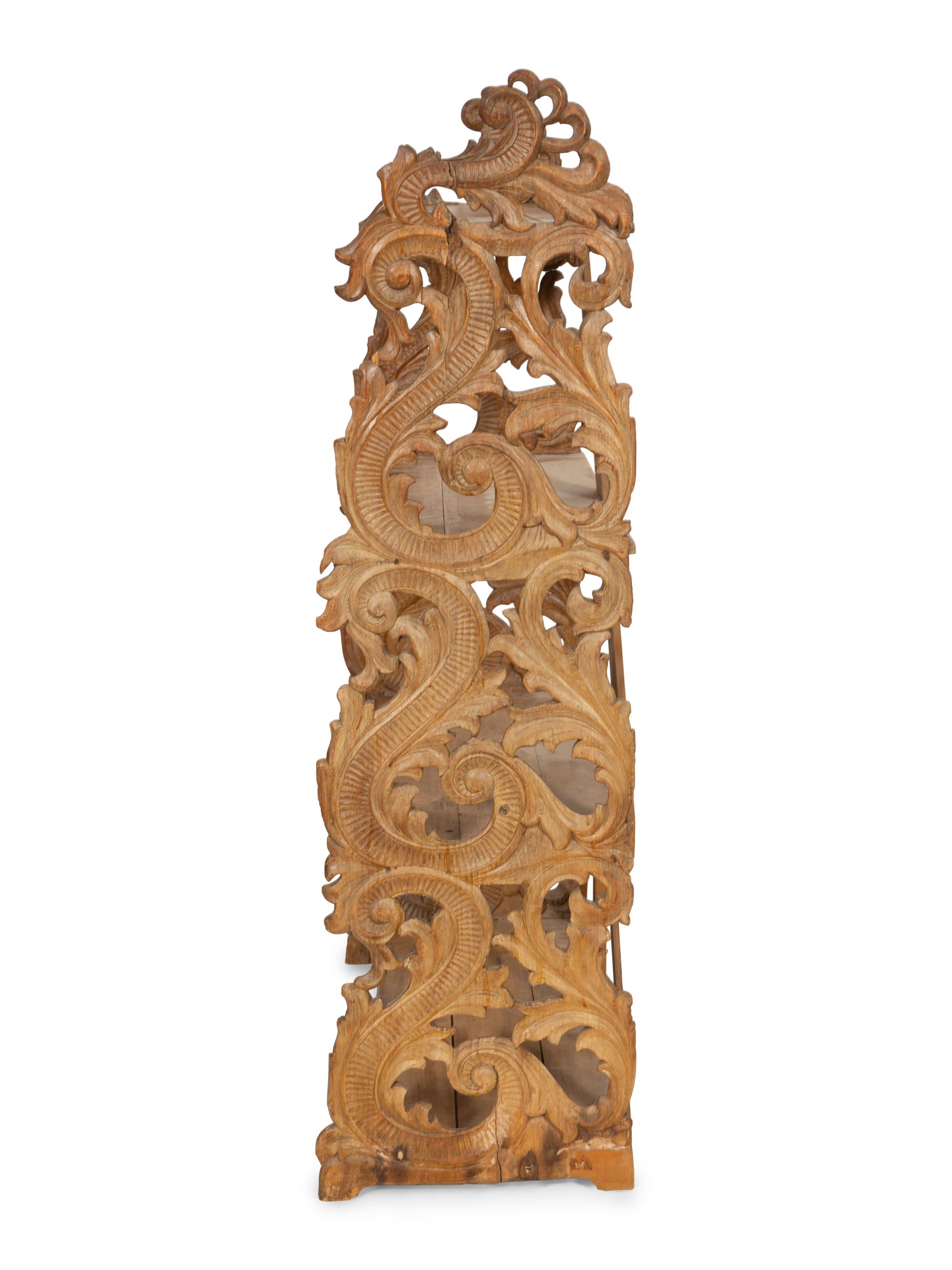 A Continental Carved Walnut Bookcase