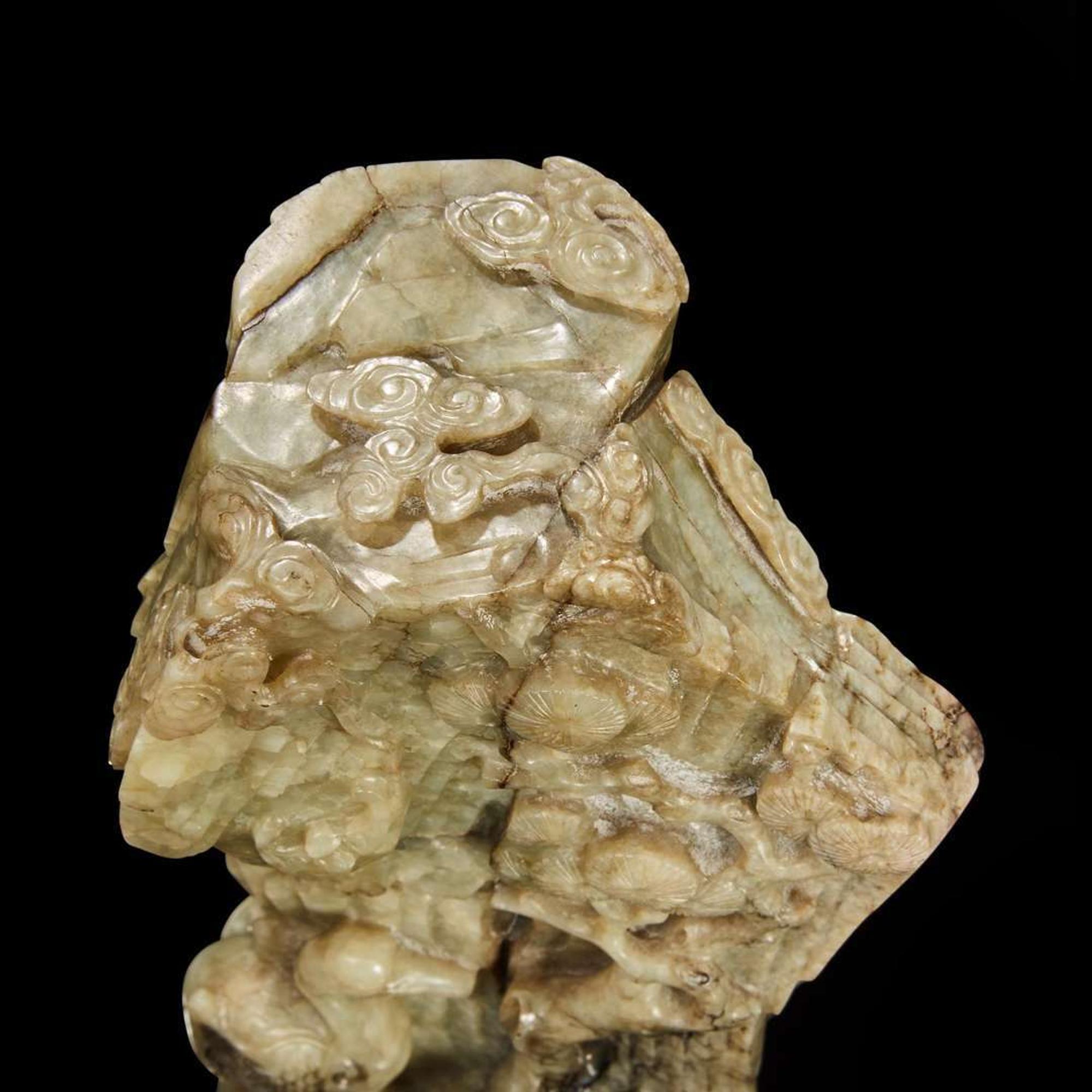 A Chinese carved grey jade "mountain" 提油灰玉山子 Ming dynasty or later
