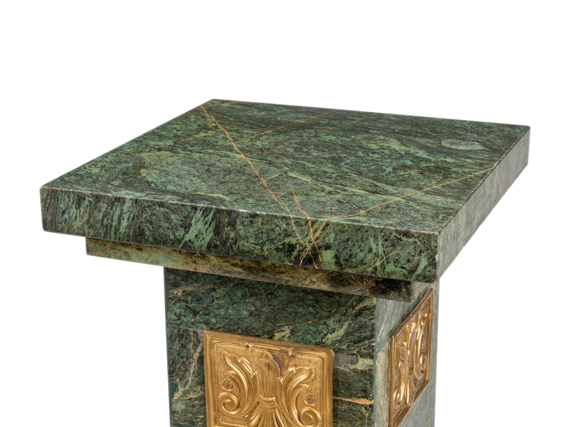 A Pair of Gilt Bronze Mounted Marble Pedestals