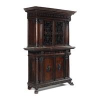 An Italian Renaissance Style Carved Walnut Cabinet