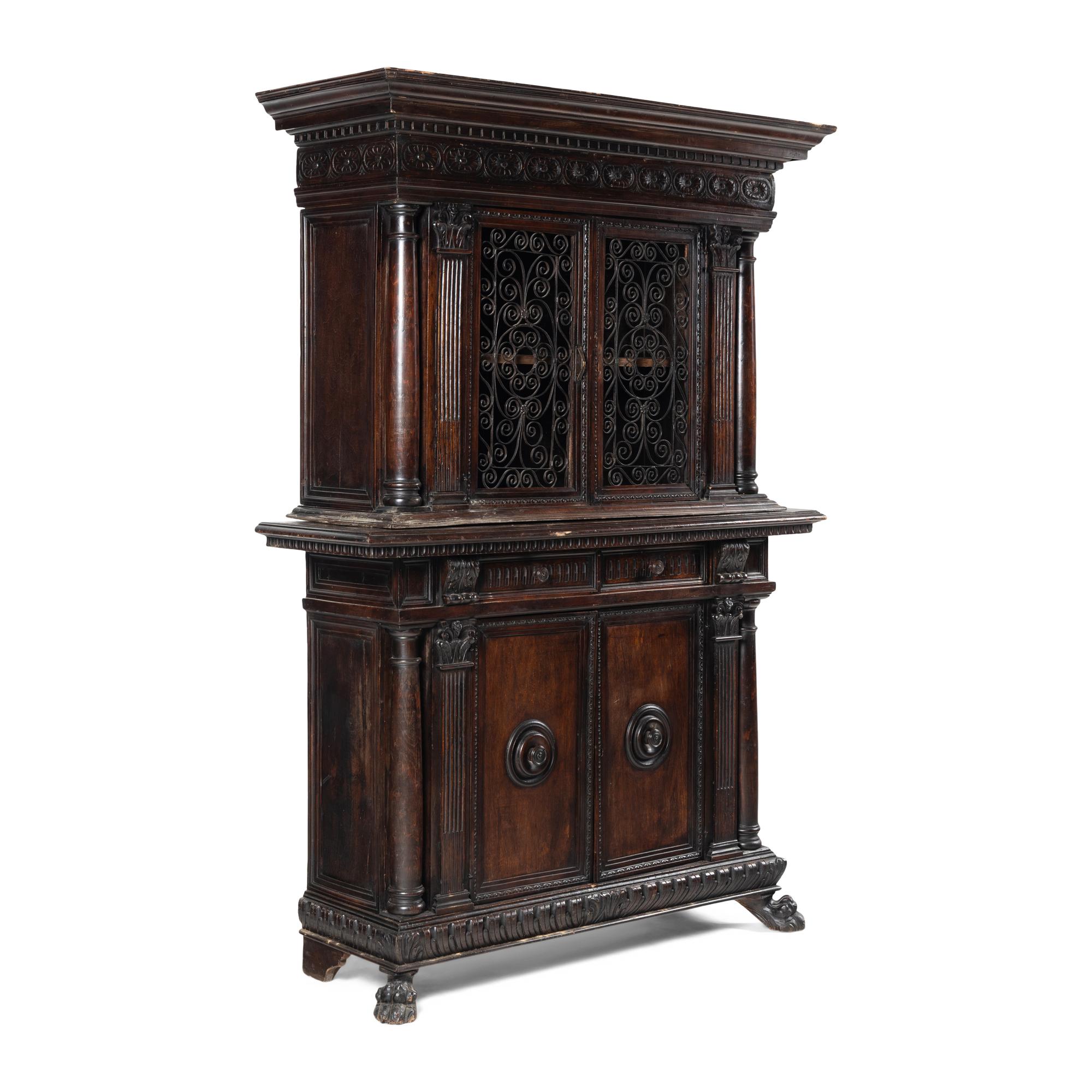 An Italian Renaissance Style Carved Walnut Cabinet