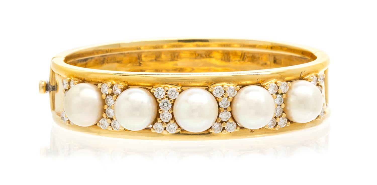 An 18 Karat Yellow Gold, Cultured Pearl and Diamond Bracelet, 41.30 dwts.