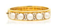 An 18 Karat Yellow Gold, Cultured Pearl and Diamond Bracelet, 41.30 dwts.
