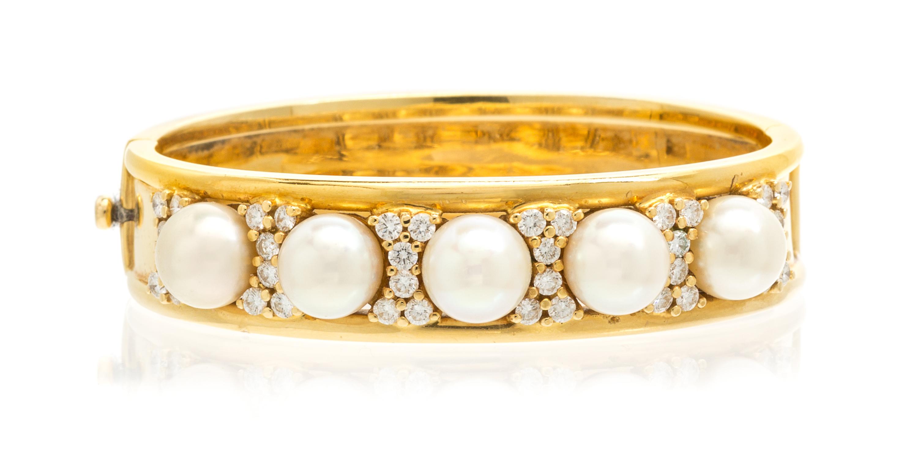 An 18 Karat Yellow Gold, Cultured Pearl and Diamond Bracelet, 41.30 dwts.