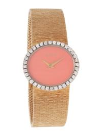 CONCORD, 14K YELLOW GOLD AND CORAL WATCH