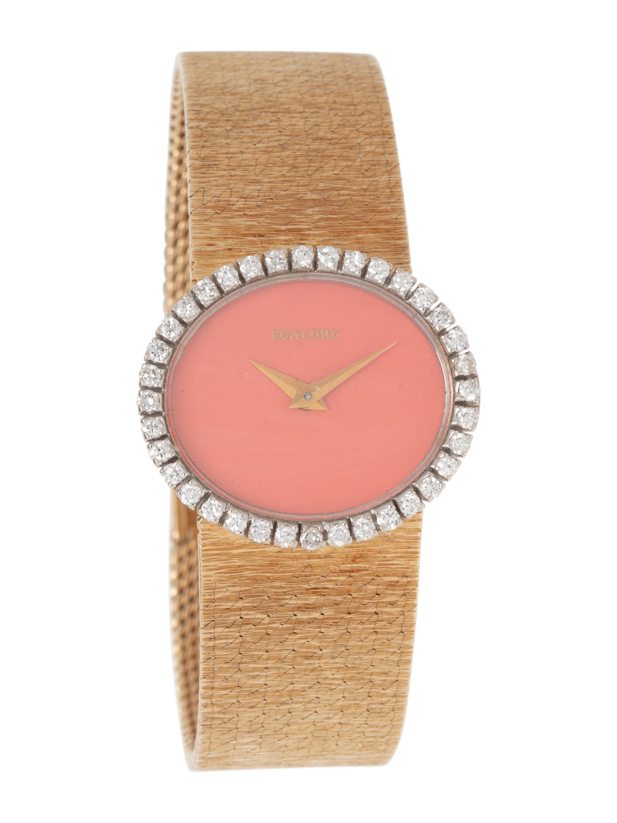 CONCORD, 14K YELLOW GOLD AND CORAL WATCH