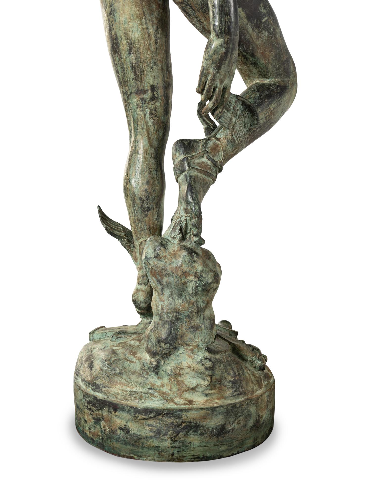 A Monumental Patinated Cast Metal Figure of Mercury