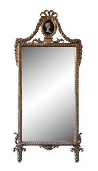 A Neoclassical Style Gilt Framed Mirror Height 54 x width 25 inches.