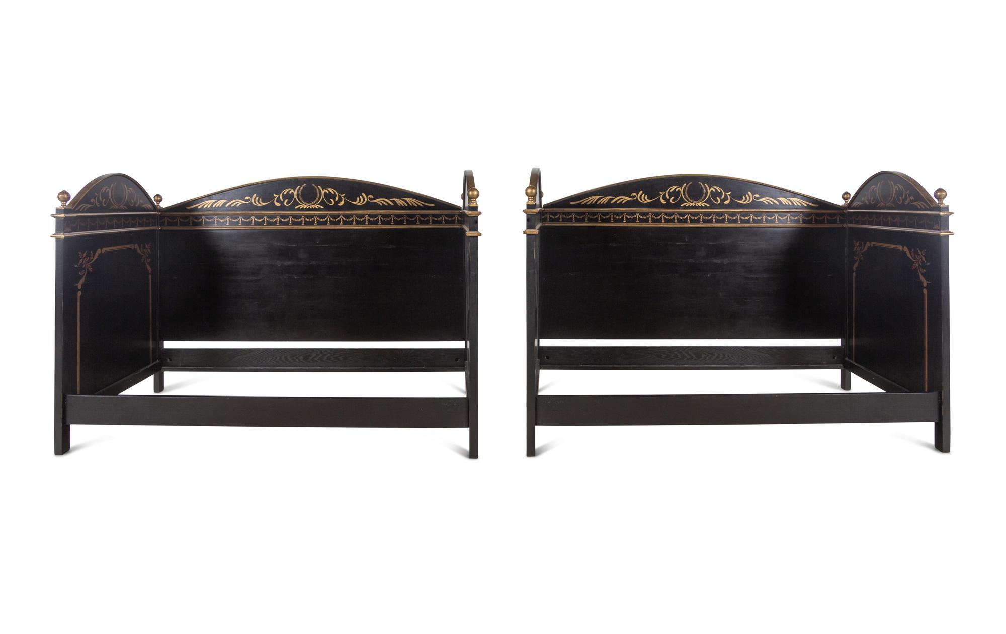 A Pair of Painted and Parcel Gilt Daybeds